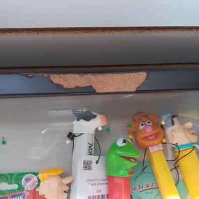 LOCKING GLASS FRONT DISPLAY CASE FULL OF PEZ DISPENSERS