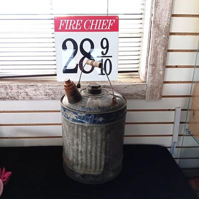 OLD GAS CAN AND A FIRE CHIEF GAS PRICE SIGN