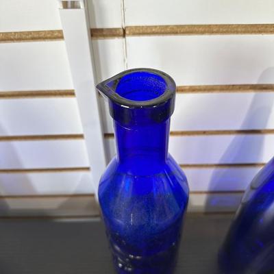 BLUE GLASS BOTTLES (2)