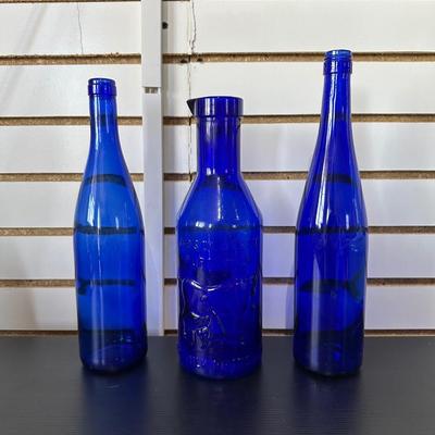 BLUE GLASS BOTTLES (2)