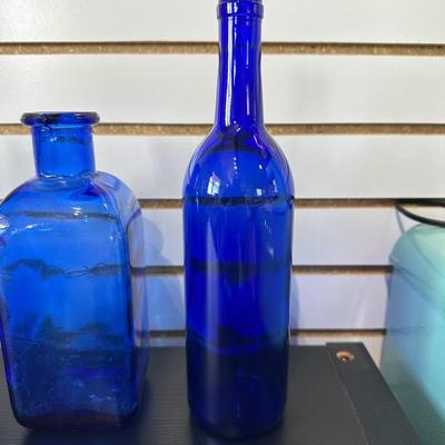 BLUE GLASS BOTTLES (4)