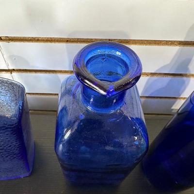 BLUE GLASS BOTTLES (4)