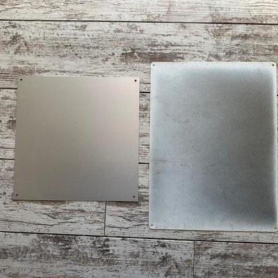 2 METAL/TIN SIGNS (4)