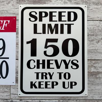 2 METAL/TIN SIGNS (4)