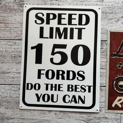 2 METAL/TIN SIGNS (5)