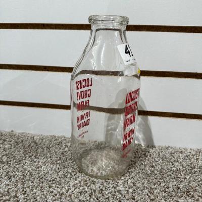 MAID-RITE WASHBOARD AND GLASS MILK BOTTLE