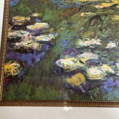 GILTWOOD FRAME WITH BEVELED MIRROR AND WATER LILIES BY MONET