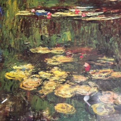 GILTWOOD FRAME WITH BEVELED MIRROR AND WATER LILIES BY MONET