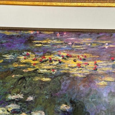 GILTWOOD FRAME WITH BEVELED MIRROR AND WATER LILIES BY MONET