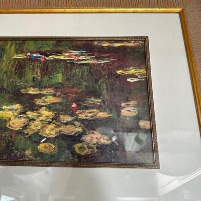 GILTWOOD FRAME WITH BEVELED MIRROR AND WATER LILIES BY MONET