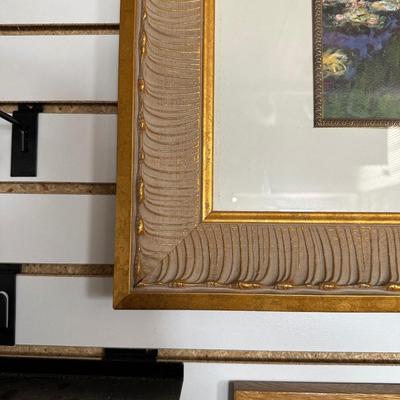 GILTWOOD FRAME WITH BEVELED MIRROR AND WATER LILIES BY MONET