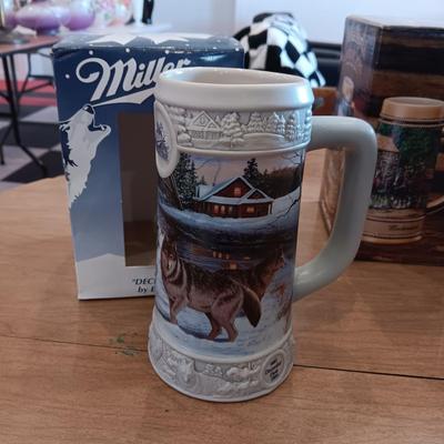 2 BUDWEISER AND 1 MILLER BEER STEINS