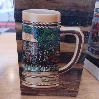 2 BUDWEISER AND 1 MILLER BEER STEINS