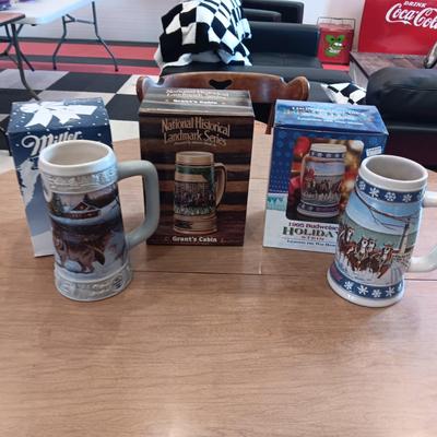 2 BUDWEISER AND 1 MILLER BEER STEINS