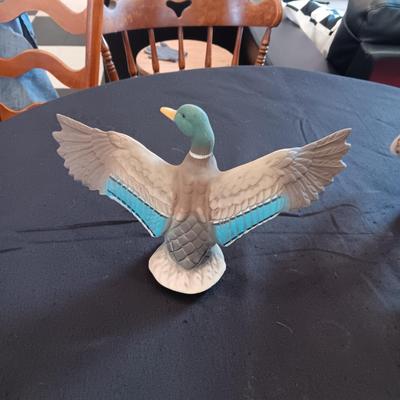 PORCELAIN MALLARD AND A CLAY SPIRIT BEAR