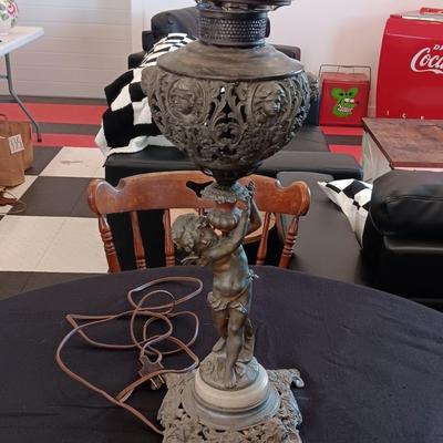 DETAILED BRASS CHERUB OIL LAMP CONVERTED TO ELECTRIC