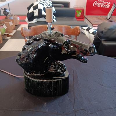 CERAMIC HORSE HEAD LAMP AND A CHALKWARE UNIVERSAL STATUARY WALL HANGING