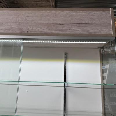 RETAIL CHECKOUT COUNTER WITH LIGHTED DISPLAY CASE