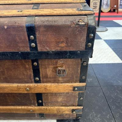 ANTIQUE WOODEN TRUNK WITH IRON ACCENTS