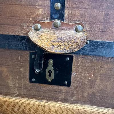 ANTIQUE WOODEN TRUNK WITH IRON ACCENTS
