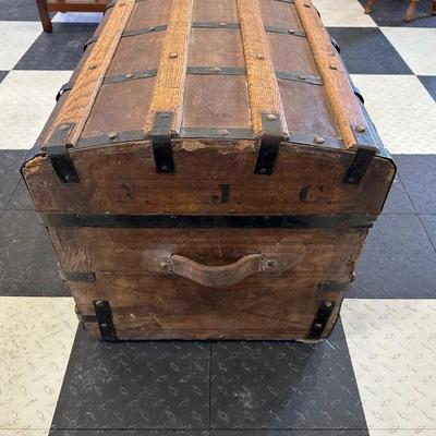 ANTIQUE WOODEN TRUNK WITH IRON ACCENTS