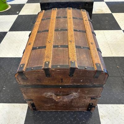 ANTIQUE WOODEN TRUNK WITH IRON ACCENTS