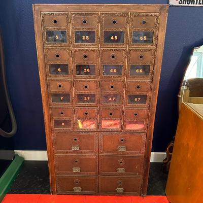 A SECTION OF OLD POST OFFICE BOXES