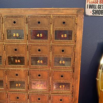 A SECTION OF OLD POST OFFICE BOXES