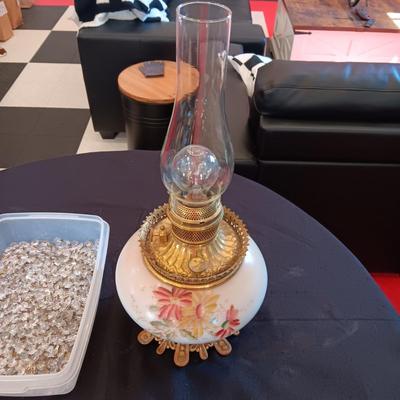 GLASS STRUNG CRYSTALS AND A PARTIAL OIL LAMP CONVERTED TO ELECTRIC