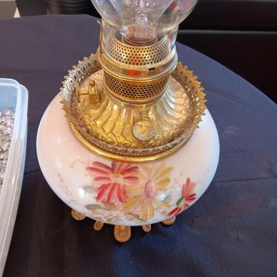 GLASS STRUNG CRYSTALS AND A PARTIAL OIL LAMP CONVERTED TO ELECTRIC