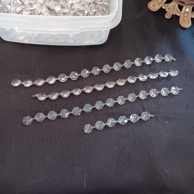 GLASS STRUNG CRYSTALS AND A PARTIAL OIL LAMP CONVERTED TO ELECTRIC