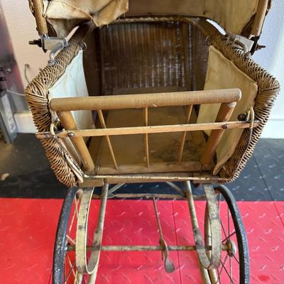 ANTIQUE WICKER DOLL CARRIAGE