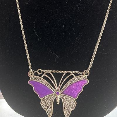 Silver toned and purple butterfly necklace