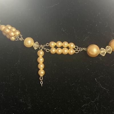 Gold toned fake pearl necklaces