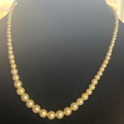 Gold toned fake pearl necklaces
