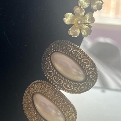 Golden toned clip on earrings