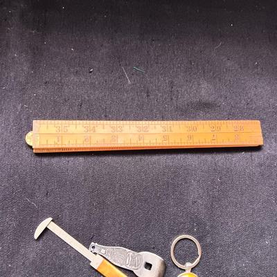 FOLDING MEASURE, KEYCHAIN, SLIDING RULER, BOTTLE OPENER & TABLE LIGHTER
