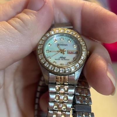 Broken clasp silver toned watch