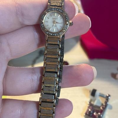 Golden toned broken watch