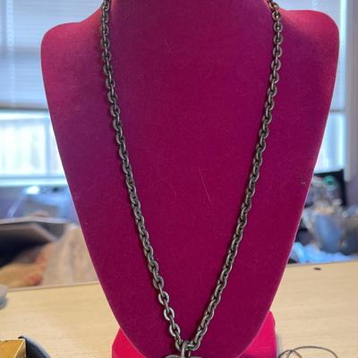 Silver toned chain with heart pendant