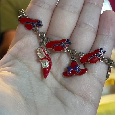 Red hat society silver toned bracelet