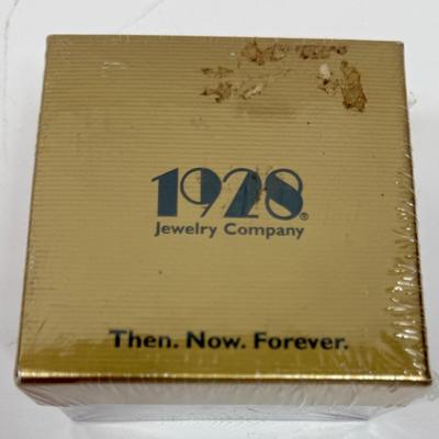 1928 brand gold-tone pin - new in box