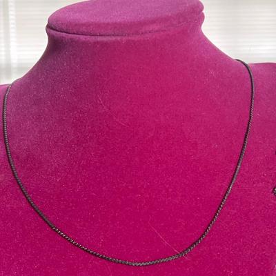 Silver toned Rooster clip on earrings with chain