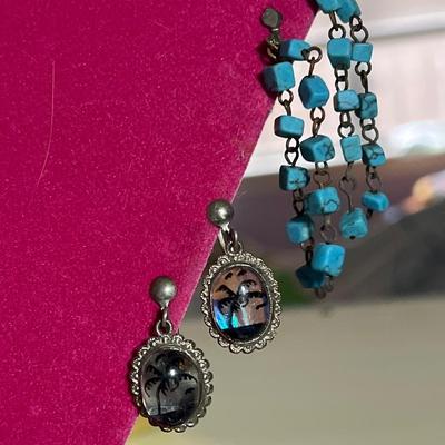 Clip on dangle earrings