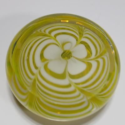 Yellow glass floral swirl paperweight