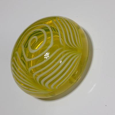 Yellow glass floral swirl paperweight