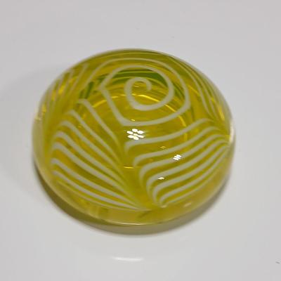 Yellow glass floral swirl paperweight