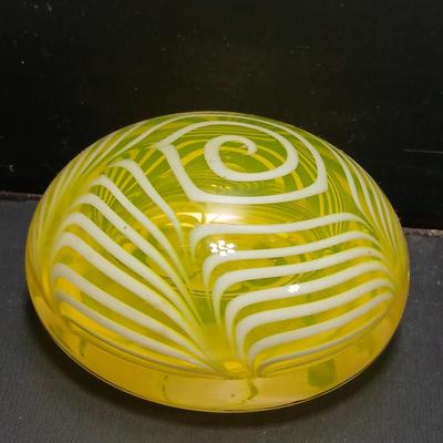 Yellow glass floral swirl paperweight