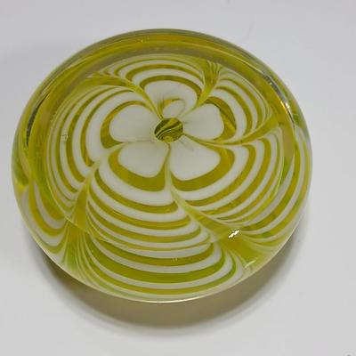 Yellow glass floral swirl paperweight