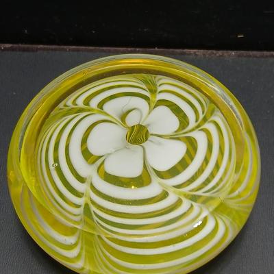 Yellow glass floral swirl paperweight